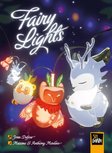 A vibrant illustration featuring the game 'Fairy Lights' by Sit Down! The cover showcases adorable, glowing characters including a friendly owl, a cute apple creature, and a magical deer, all adorned with bright fairy lights against a whimsical, colorful background. The game's title is prominently displayed in elegant, luminous lettering at the top.