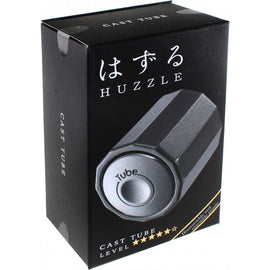 The Cast Tube by Hanayama is a beautifully designed mechanical puzzle, featuring a hexagonal shape with a sleek black finish. The box includes a clear image of the puzzle and its name written in kanji, exuding a modern yet classic appeal. It showcases a difficulty level, indicating a challenge for puzzle enthusiasts of all ages.