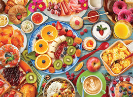 A colorful jigsaw puzzle depicting a breakfast table filled with a variety of delicious foods. The image showcases an array of fruits including oranges, bananas, and berries, along with pastries like croissants and donuts, and dishes like scrambled eggs, yogurt, and granola. The vibrant colors and detailed presentation create an inviting and appetizing scene perfect for breakfast lovers.