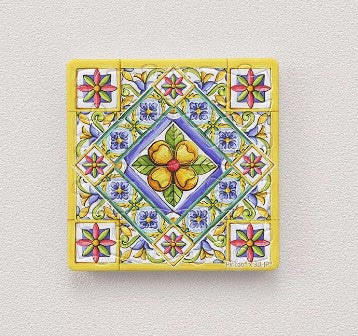 A vibrant, decorative jigsaw puzzle magnet featuring a resplendent flower design. The puzzle showcases intricate patterns with colorful flowers surrounded by ornate details, perfect for home decor or a delightful gift. Sized for easy display, this 16-piece magnet puzzle combines art and functionality.