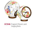 A beautifully crafted 3D jigsaw puzzle clock titled 'Fragrant Flowers and Singing Birds' by Pintoo. The clock features vibrant illustrations of birds and colorful flowers on a round surface, showcasing intricate details and a stylish design. Ideal for puzzle enthusiasts and home decor lovers, this clock combines functionality with art.
