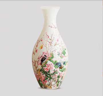 A stunning 3D jigsaw puzzle shaped like a vase featuring intricate designs of flowers and birds. The puzzle showcases vibrant colors and detailed illustrations, perfect for puzzle enthusiasts and nature lovers.