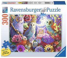 A colorful jigsaw puzzle box featuring the Night Owl Hoot design by Ravensburger. The illustration showcases various intricately designed owls amidst vibrant flowers, with large pieces noted as easy to see and hold. The packaging emphasizes premium quality and soft-click technology, suitable for puzzle enthusiasts.