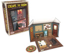 Escape the Room: Murder in the Mafia game by ThinkFun. The image shows the game box and a detailed 3D room setup with a desk, cabinets, clues on the walls, and a carpeted floor featuring a body outline and a circular clue board. This immersive game challenges players to solve a murder mystery using logic and teamwork.