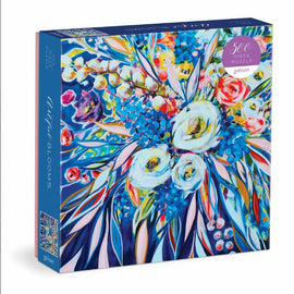 Artful Blooms jigsaw puzzle by Galison featuring a vibrant floral design with colorful flowers and leaves. The puzzle contains 500 pieces and is beautifully packaged, showcasing a modern art style that will engage puzzle enthusiasts.