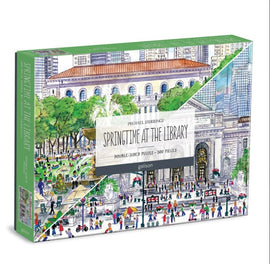 The Springtime at the Library jigsaw puzzle by Michael Storrings showcases a vibrant spring scene around a library, featuring lush greenery, people enjoying the outdoors, and iconic library architecture. The puzzle is double-sided with 500 pieces and comes in an illustrated box.