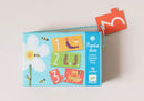 The Numbers Puzzle Duo by DJECO features a colorful jigsaw puzzle box designed for children aged 3 and up. The box showcases puzzles with numbers 1, 2, and 3 alongside playful illustrations of animals. It contains a total of 10 engaging puzzles that promote learning and development.