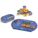 DJECO's Aquarium Logic is a colorful mechanical puzzle featuring circular wooden tokens with various sea creature designs. The game includes a blue base where players strategically place these tokens based on challenge cards, promoting critical thinking and problem-solving skills. The vibrant graphics and interactive components make it ideal for children and family game nights.