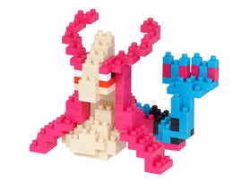 Nanoblock DIY kit featuring Milotic, an elegant serpentine Pokémon, constructed with colorful interlocking blocks. The model showcases pink, blue, and cream colors, highlighting intricate details like flowing fins and expressive eyes.