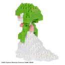 A detailed Nanoblock model of Gardevoir from Pokémon, featuring vibrant green and white blocks. The figure showcases Gardevoir's flowing dress and elegant posture, standing on a white base, with pink accents on its arms, representing the beloved character in a compact DIY format.