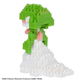 A detailed Nanoblock model of Gardevoir from Pokémon, featuring vibrant green and white blocks. The figure showcases Gardevoir's flowing dress and elegant posture, standing on a white base, with pink accents on its arms, representing the beloved character in a compact DIY format.