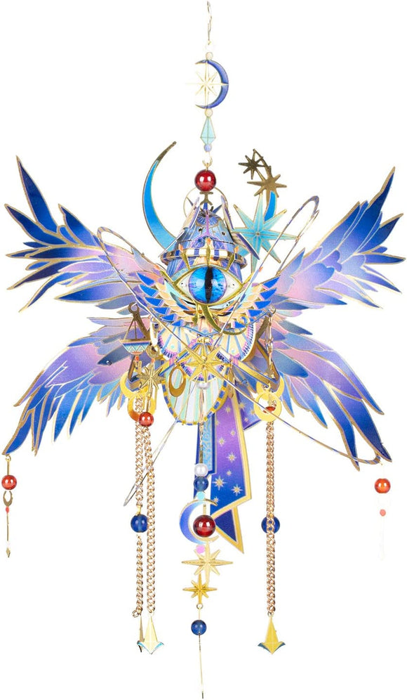 The Eye of Horus DIY kit by Mu Model, featuring a beautifully crafted design with vibrant blue and gold colors. The kit includes various hanging ornaments, including celestial symbols and decorative beads, perfect for creative enthusiasts looking to assemble a stunning piece that embodies ancient Egyptian mythology.