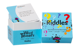 A box of Word Teasers Riddles featuring colorful question marks on the exterior. The top of the box displays the word 'Riddles' prominently, while a card peeks out, posing a riddle, 'I have wings and a tail and I fly through the skies. I'm not a bird or a bat. What am I?' Ideal for family fun, this game encourages talking, laughing, and learning.