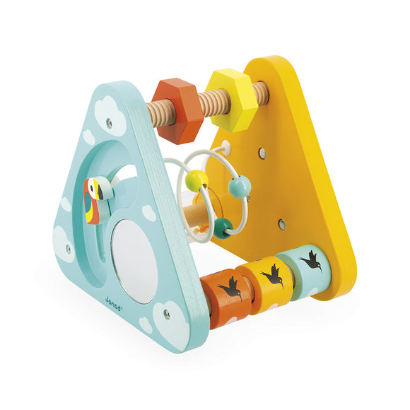 The Tropik Multi-Activity Triangle by Janod is a vibrant wooden activity toy designed for young children. It features a playful design with colorful shapes including a rolling ball, a mirror, and spinning elements. The activity triangle encourages sensory exploration, fine motor skills, and imaginative play while providing visual stimulation with its cheerful colors and fun bird motifs.