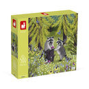 Raccoon Bandits jigsaw puzzle by Janod featuring a whimsical illustration of two raccoons interacting in a vibrant forest scene adorned with colorful flowers and trees. The puzzle contains 500 pieces and emphasizes fun for children and families.