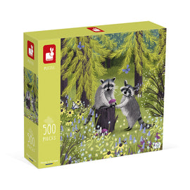 Raccoon Bandits jigsaw puzzle by Janod featuring a whimsical illustration of two raccoons interacting in a vibrant forest scene adorned with colorful flowers and trees. The puzzle contains 500 pieces and emphasizes fun for children and families.