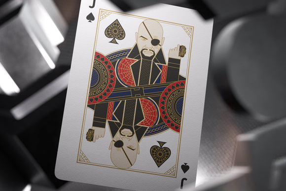 A close-up view of a Jack of Spades playing card featuring a stylized character design inspired by Spider-Man. The card showcases intricate graphics with vibrant colors, including red, blue, and gold, along with unique patterns and textures, making it a striking addition to any playing card collection.