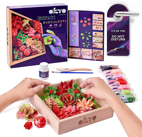 A hands-on DIY kit featuring the OKTO Clay DIY Succulents Clay Kit: Passion. The kit includes colorful clay in vibrant hues, a set of instructions, an acrylic varnish, a paintbrush, and a creative craft tray filled with beautifully crafted succulent shapes. It is ideal for sensory art activities and encourages creativity.