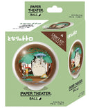 Paper Theater Ball featuring Totoro at the Bus Stop. This DIY craft kit by Ensky includes intricate paper designs depicting Totoro and a young girl under an umbrella surrounded by trees. The product is packaged in a colorful box, highlighting the creative diorama experience.