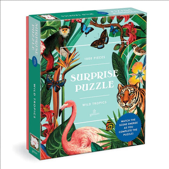 The Wild Tropics Surprise Puzzle by Galison features vibrant, tropical artwork with a variety of animals and plants. This jigsaw puzzle contains 1000 pieces and showcases a flamingo, tiger, butterflies, and lush greenery, creating a captivating scene. The intricately designed box provides a glimpse of the image to be completed, making it perfect for puzzle enthusiasts of all ages.