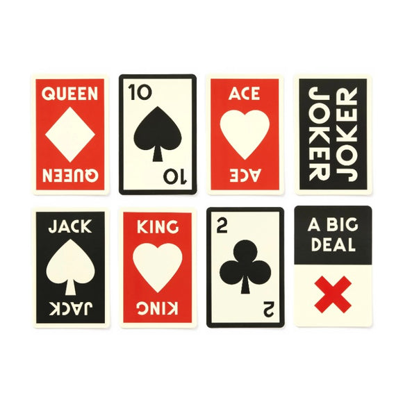 A set of giant playing cards featuring various suits and ranks. The cards display a Queen of Diamonds, a Jack and King of Spades, an Ace and 10 of Hearts, a 2 of Clubs, and two Jokers labeled 'A BIG DEAL.' The vibrant colors feature red, black, and white, illustrating a playful and oversized design ideal for fun group games.