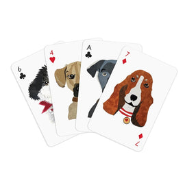 A set of playing cards featuring colorful illustrations of various dog breeds. The cards showcase a fluffy dog with a red scarf, a playful pause, a sleek black dog, and a charming basset hound with a collar, all displayed in a fan shape.