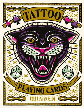 Tattoo Playing Cards by Chronicle Books featuring a striking illustration of a fierce black panther's face surrounded by symbols like dice and playing card suits. The vibrant design captures the essence of tattoo art, making it a unique addition to any card game lover's collection.