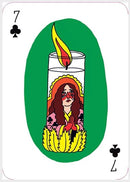 Day of the Dead themed playing card featuring the number 7 of clubs. The card depicts a candle with flames, surrounded by vibrant colors and a figure with red painted eyes in a traditional outfit, symbolizing remembrance and celebration.