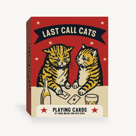 A vibrant packaging of 'Last Call Cats Playing Cards' features two playful striped kittens engaged in a card game. The box showcases a retro design with bold colors, including red and cream, along with playful graphics of a bottle and a cup. Perfect for cat lovers and card game enthusiasts alike.