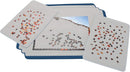A close-up image of the Puzzle Pad featuring a 1500-piece jigsaw puzzle by Heye. Several puzzle pieces are scattered on two trays, while a partially completed section is visible on the main pad. The trays and pad are designed for organizing puzzle pieces, showcasing a variety of colors and shapes.