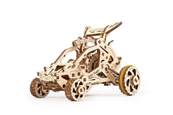 Ugears 3D Mini Desert Buggy DIY kit features an intricately designed wooden model in the shape of a mini buggy. This mechanical model showcases detailed craftsmanship with visible gears and wheels, perfect for enthusiasts looking for a creative challenge.