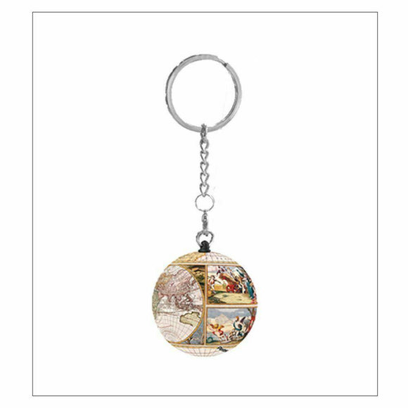 A vintage-style keychain featuring an antique nautical map design on a spherical jigsaw puzzle piece. The keychain is attached to a metal ring and chain, showcasing detailed illustrations of historical maps and nautical themes.