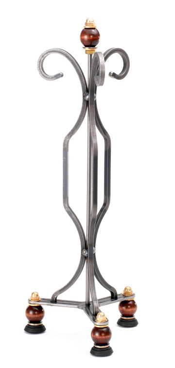 The Tavern Puzzle Stand - Triple by Tucker Jones House features a uniquely designed metal frame with ornate curves and wooden accents. The stand supports mechanical puzzles and showcases a stylish blend of durability and elegance, making it a perfect addition to any puzzle enthusiast's collection.