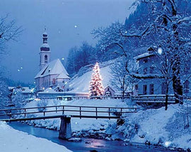 A beautifully detailed jigsaw puzzle titled 'Christmas Village' by Springbok, featuring a serene winter scene with a snow-covered landscape, a quaint church, and a sparkling Christmas tree in the foreground. The puzzle captures the enchanting beauty of a snowy village, creating a festive atmosphere perfect for holiday enthusiasts.