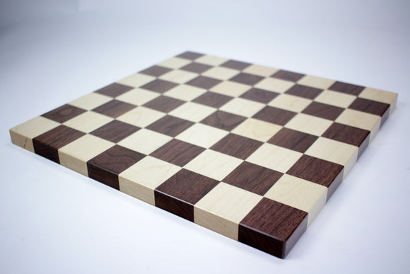14-inch wooden chessboard made by Jk Creative Wood with alternating dark and light squares, featuring 1.75-inch square dimensions. This beautifully crafted game board is ideal for chess enthusiasts and makes an elegant addition to any game collection.