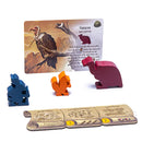 The Everdell Spirecrest Expansion by Tabletop Tycoon includes vibrant wooden critter pieces in blue, orange, and red. An illustrated card featuring a Firebeak bird provides game instructions. The expansion enhances gameplay with strategic elements and unique critters.
