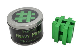 Heavy Metal: Gridlock mechanical puzzle by Eureka Puzzles. The product features a compact, green metal puzzle with interlocking pieces, displayed next to a round tin container labeled 'Heavy Metal Mechanics'. The tin has a sleek black finish with green accents, showcasing the unique design of the puzzle inside.