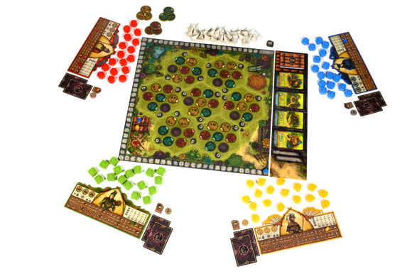 A colorful board game titled 'Garden Nation' by BOMBYX. The game features a large board depicting a garden landscape, with various tokens and pieces like red, green, yellow, and blue markers surrounding the board. Player boards with unique illustrations and counters are placed at each corner, enhancing the game strategy.