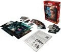 The Resistance board game by Indie Boards and Cards, featuring components such as character cards, game boards, tokens, and the main box. The game is set up for play, showcasing its strategic elements and social deduction theme.