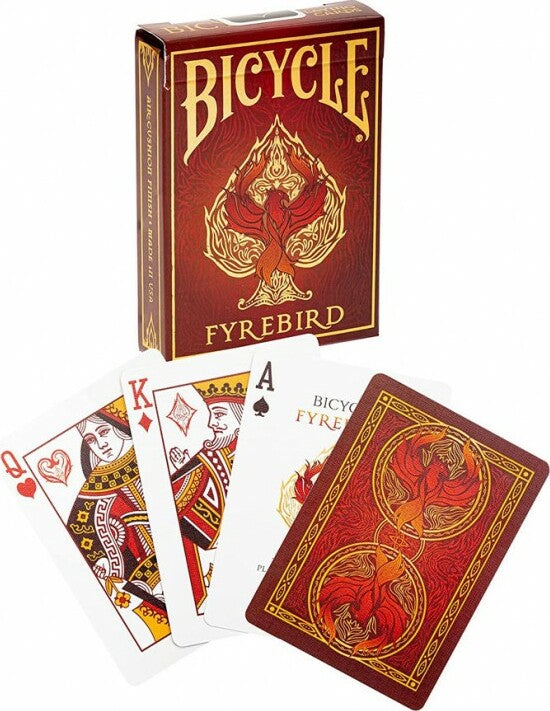 Bicycle Fyrebird playing cards displayed with a pack. The box features intricate designs with a fiery bird motif, and several cards show beautifully illustrated court cards and an Ace featuring the Fyrebird logo.