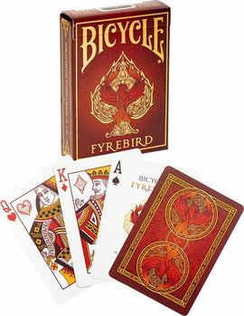Bicycle Fyrebird playing cards displayed with a pack. The box features intricate designs with a fiery bird motif, and several cards show beautifully illustrated court cards and an Ace featuring the Fyrebird logo.