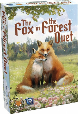 The Fox in the Forest Duet game box featuring two adorable foxes nestled together in a lush green meadow adorned with colorful flowers, set against a backdrop of trees under a clear sky. The game is designed for two players, promising a romantic and strategic card-playing experience.