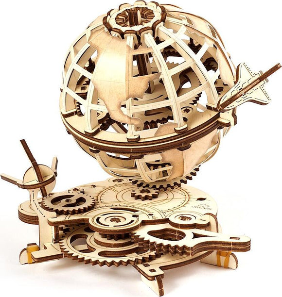 A beautifully crafted wooden globe model by UGears 3D, featuring intricate gears and mechanisms. The globe is partially see-through, showing the continents delicately carved into the wood, and is mounted on a base with additional mechanical elements, making it a captivating DIY kit for hobbyists and puzzle enthusiasts.