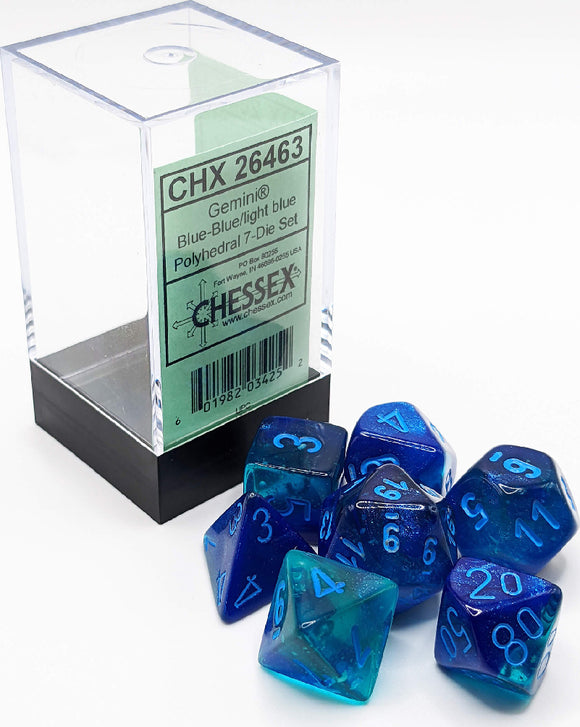 Gemini Blue/Light Blue Lumin Poly 7-die set by Chessex showcases a variety of polyhedral dice in shades of blue, featuring clear and opaque designs with engraved numbers. The set comes in a clear display case, highlighting the beautiful color gradient and providing easy storage for game enthusiasts.