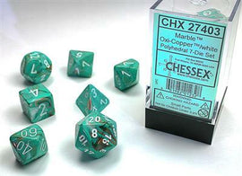A Marble Oxi-Copper with White Polyhedral Dice Set by Chessex, featuring seven neatly showcased multi-sided dice in vibrant green and copper colors. The packaging is clear, displaying the product name and details, ideal for tabletop RPG enthusiasts.