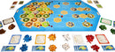 Catan: Seafarers – 5-6 Player Extension game setup featuring a colorful board with hexagonal tiles representing islands, seas, and resources. The game includes wooden player pieces in various colors, resource cards, and development cards, creating a vibrant atmosphere for strategic gameplay. Perfect for expanding the classic Catan experience to accommodate more players.