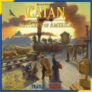 Catan Histories: Settlers of America - Trails to Rails game box featuring an illustrated scene of a bustling train station in the American frontier. The artwork shows a steam locomotive, travelers in period clothing, and covered wagons in the background, evoking themes of exploration and settlement.