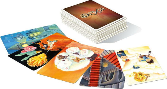 Dixit: Odyssey game by Asmodee featuring beautifully illustrated cards spread out. The stack of cards shows unique artwork that inspires storytelling and creativity.