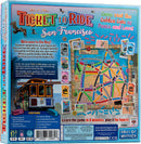 Ticket to Ride: San Francisco board game by Days of Wonder. The back of the box displays the game components, including a colorful game board featuring iconic San Francisco locations like the Golden Gate Bridge and Alcatraz. It highlights a fun, fast-paced gameplay experience suitable for 2-4 players aged 8 and up, with elements like tourist tokens and destination tickets.