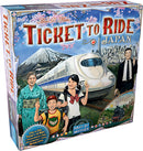 The Ticket to Ride: Japan & Italy Expansion game box features vibrant artwork depicting a scenic train journey in Japan, including cherry blossoms and iconic landmarks. The design includes characters in traditional Japanese attire and modern clothing, showcasing cultural elements of both Japan and Italy. The box is colorful and attractively illustrated, making it appealing for family game nights.